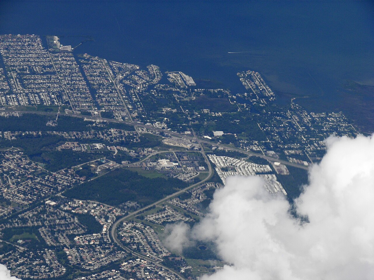 Aerial view of Hudson, Florida showing coastal canals along the Gulf